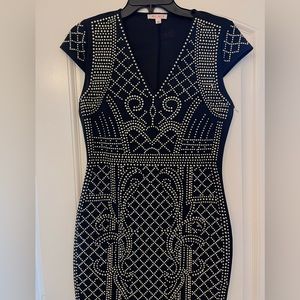 Large Agaci short sleeve black dress with rhinestones